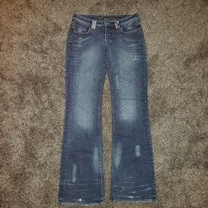 BEBE Spellout Distressed Bootcut Jeans 29